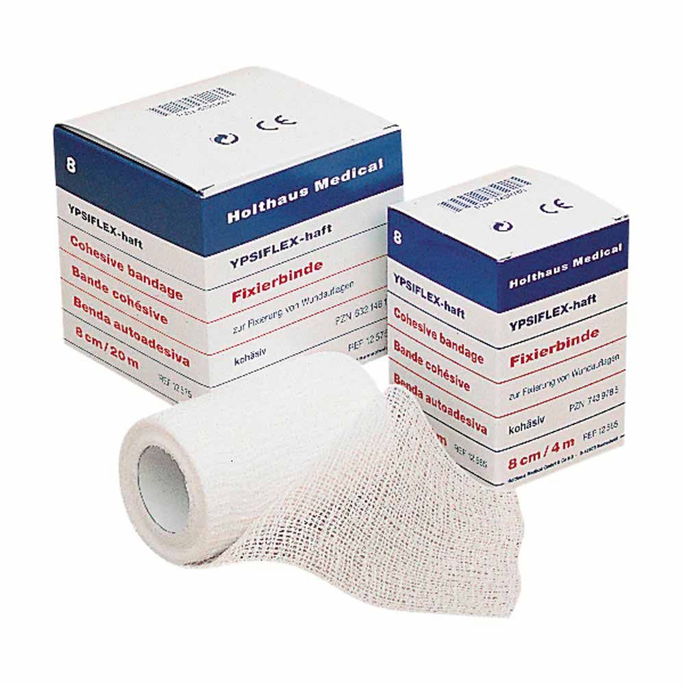 Haft-Mullbinde YPSIFLEX® haftend: hellgraue Mullbinde auf Rolle, zusammen mit Packung