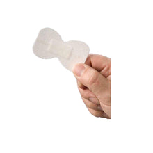 Fingerkuppenpflaster aus Vlies, hellbeige, an einen Finger geklebt